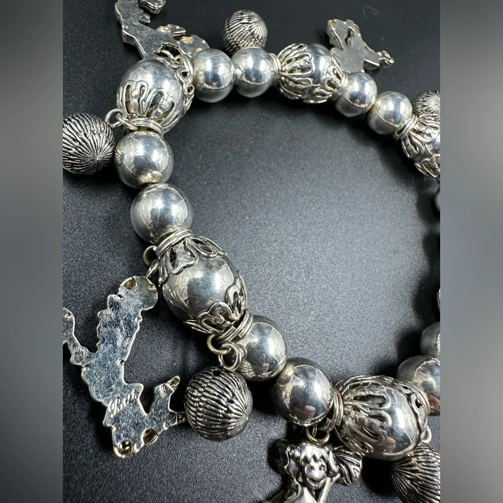 Best Signed Vintage Silver Cheer Leader Ornate Beaded stretch Charm Bracelet